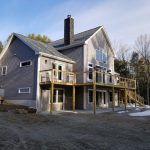 Custom built home with deck with cable rails