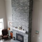 A look at the fireplace from the loft